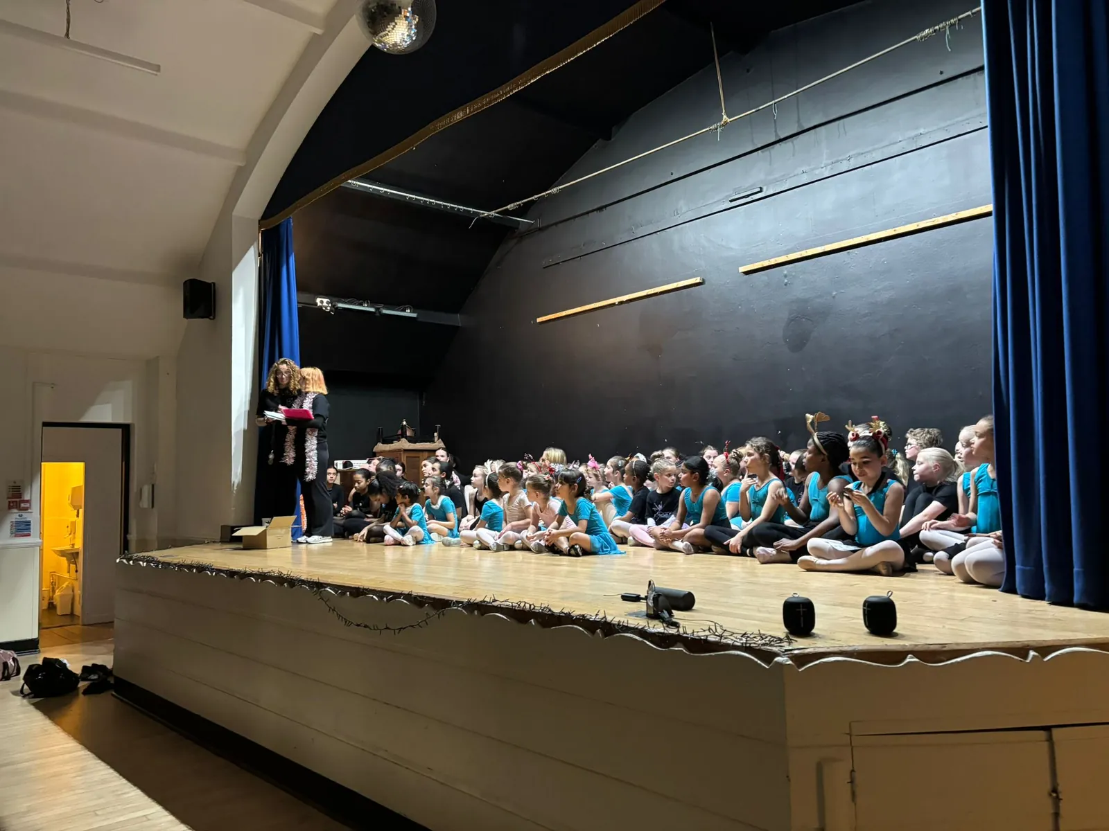 The audience watching dancers at the Christmas Showcase 2025