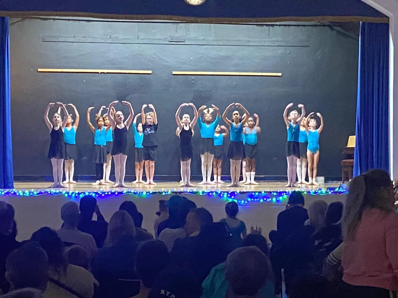 Dancers performing on stage at the MK Dance Christmas Showcase 2025