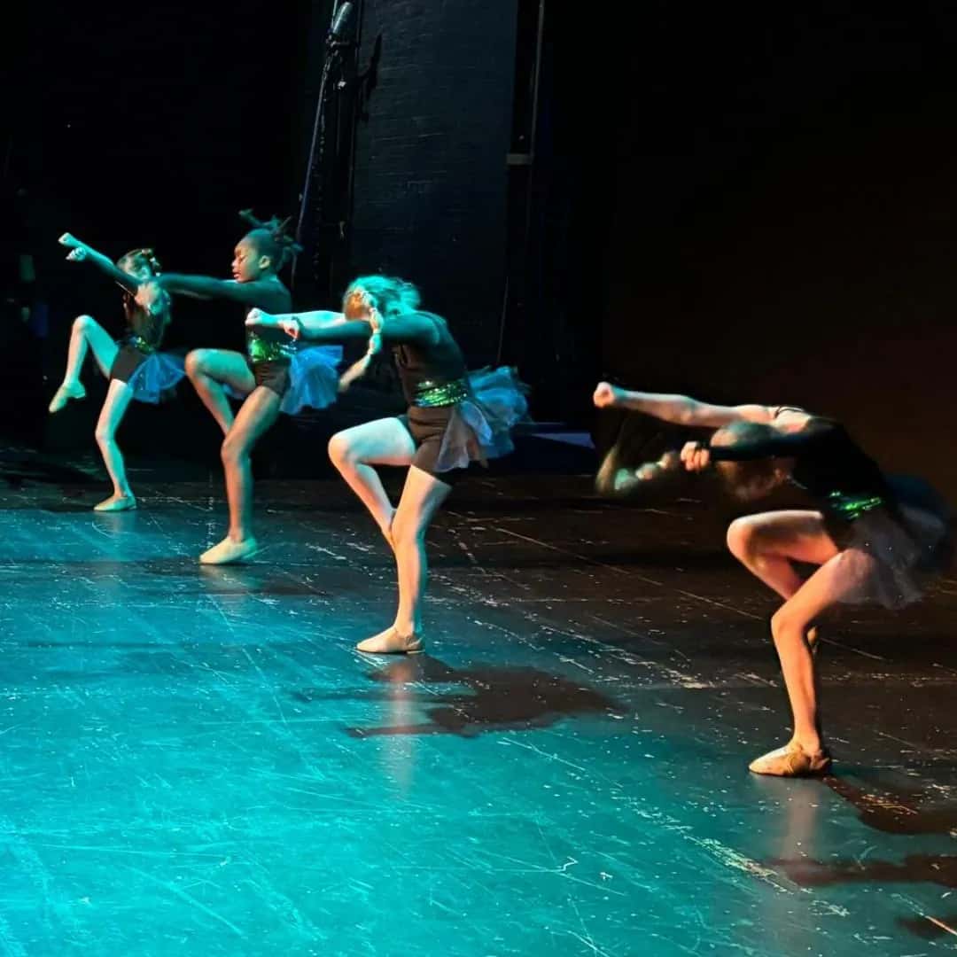 MK Associates dancing on stage at the Theatre Royal Brighton
